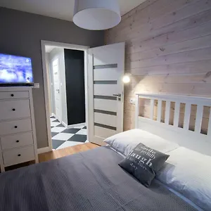 https://apartament-lokum.szklarskaporebahotels.net